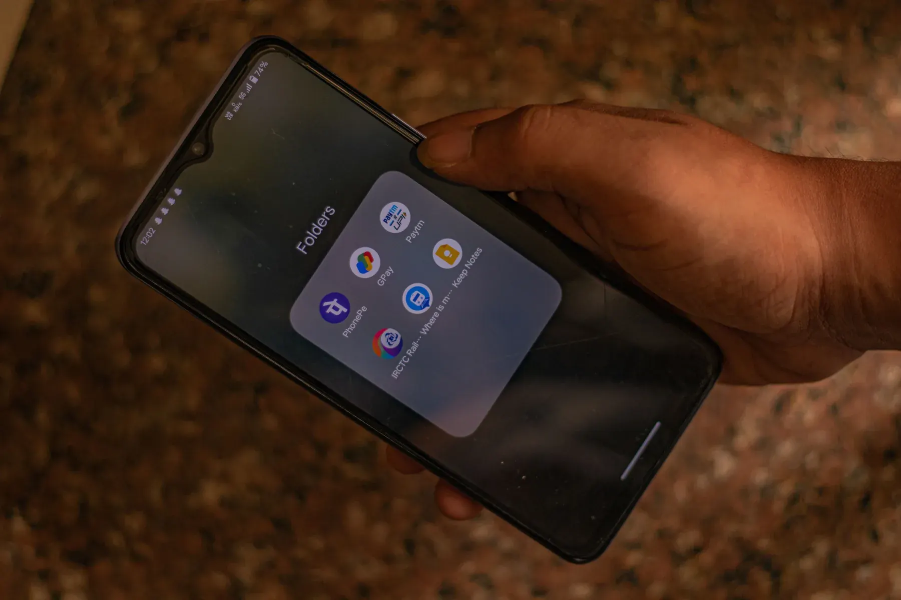 Smartphone displaying digital payment applications
