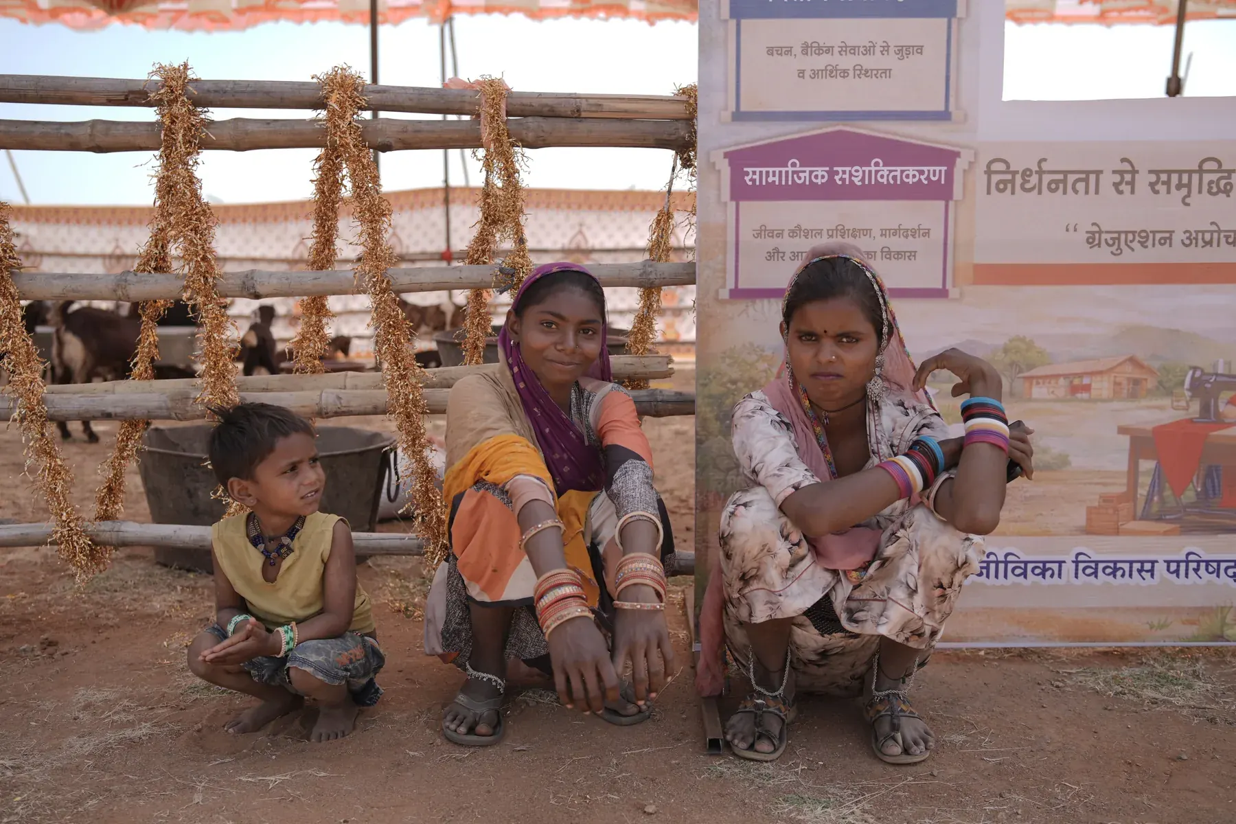 Women and child at a rural community event