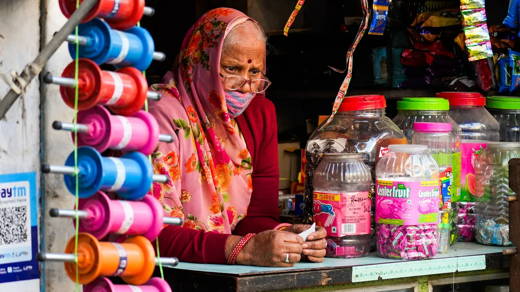 Indian small business owner at a local shop